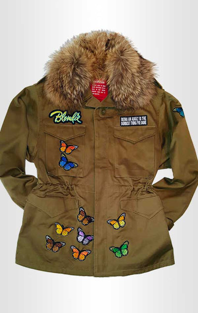 Front view of CdJ Furfly jacket with butterfly embellishments and fur collar. 