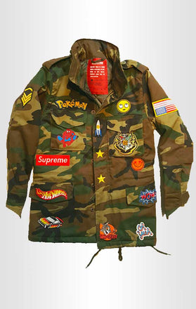 Load image into Gallery viewer, Front view of CdJ KidsRock jacket in camo print with kid-friendly embellishments.
