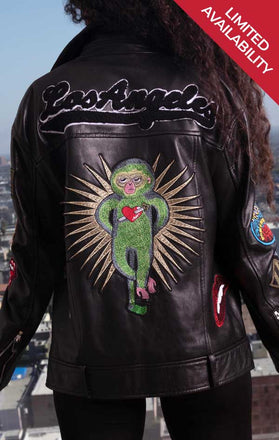 Load image into Gallery viewer, Limited availability! Female models back of black leather CdJ Hello Moto jacket with large embroidered embellishments.
